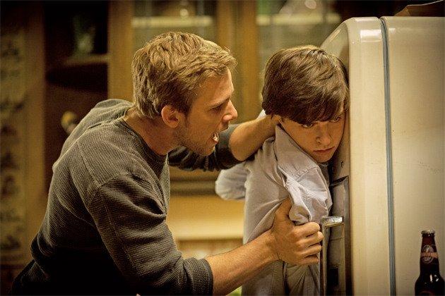 19-dylan-holds-norman-up-against-the-fridge