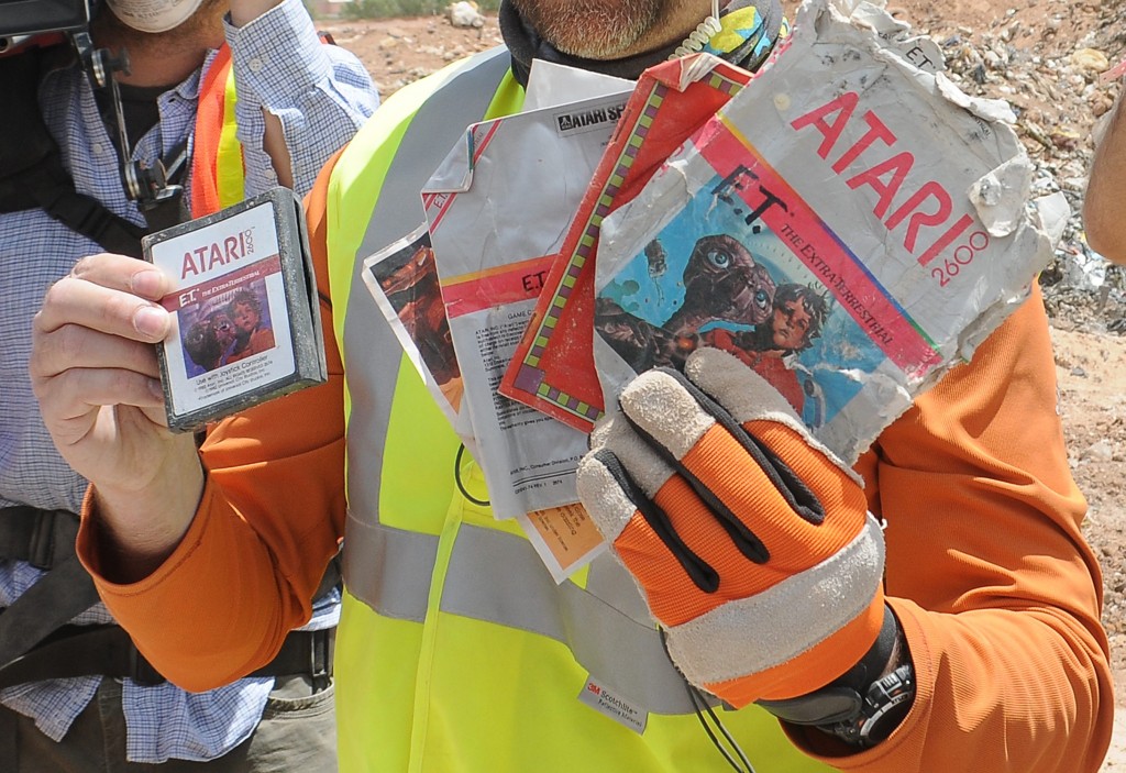 A worker shows the media the first recovered "E.T. the Extra-Terrestrial" cartridge at the old Alamogordo landfill in Alamogordo